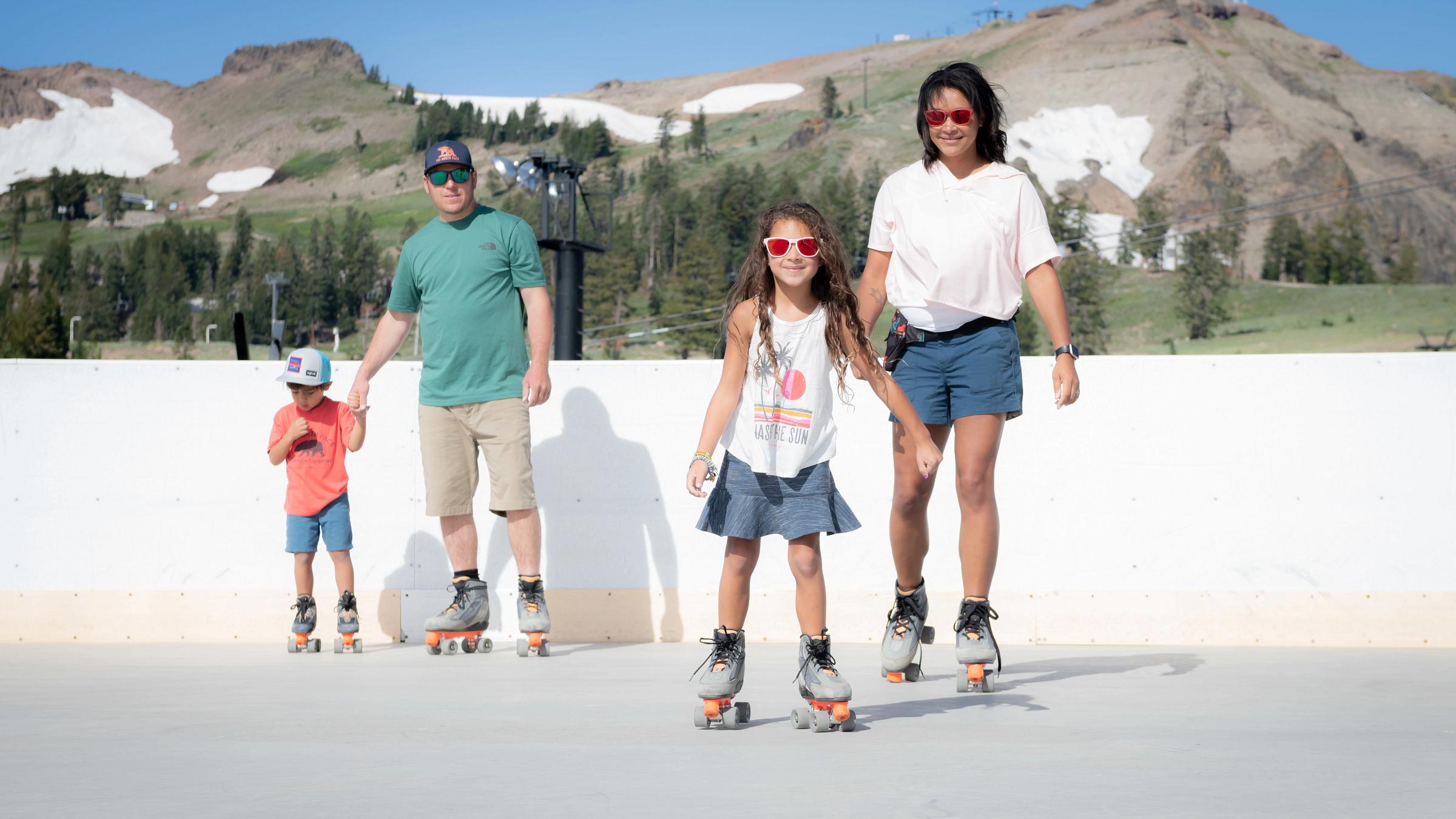 Family Roller skating at High Camp at Squaw Valley