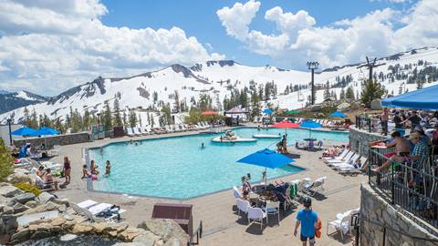 people enjoying the High Camp pool during the Spring