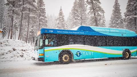 A regional TART bus on a storm day.