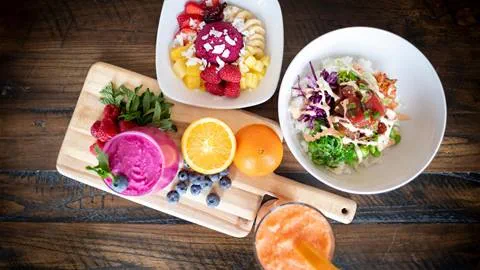 A sampling of smoothies, acai bowls, and poke bowls from new restaurant Sun Bowl