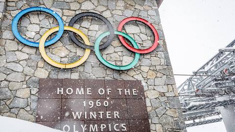 Olympic Rings on the Funitel Building during a snow storm