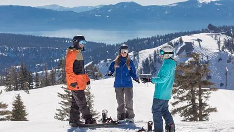 Snowboard School group lesson lifestyle above Lake Tahoe at Squaw Valley