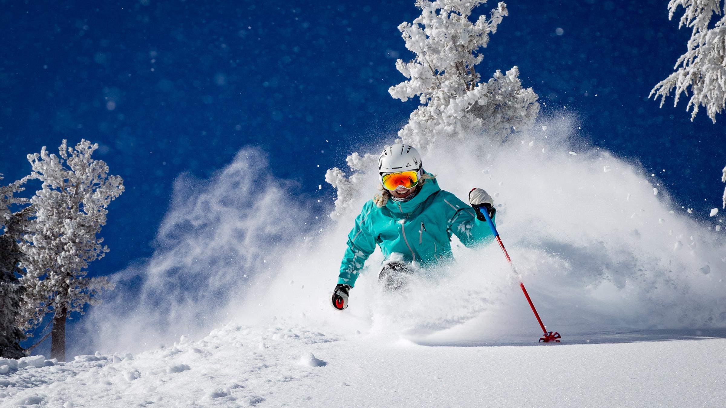 Amie Engerbretson skiing powder on a blower bluebird pow day at squaw valley