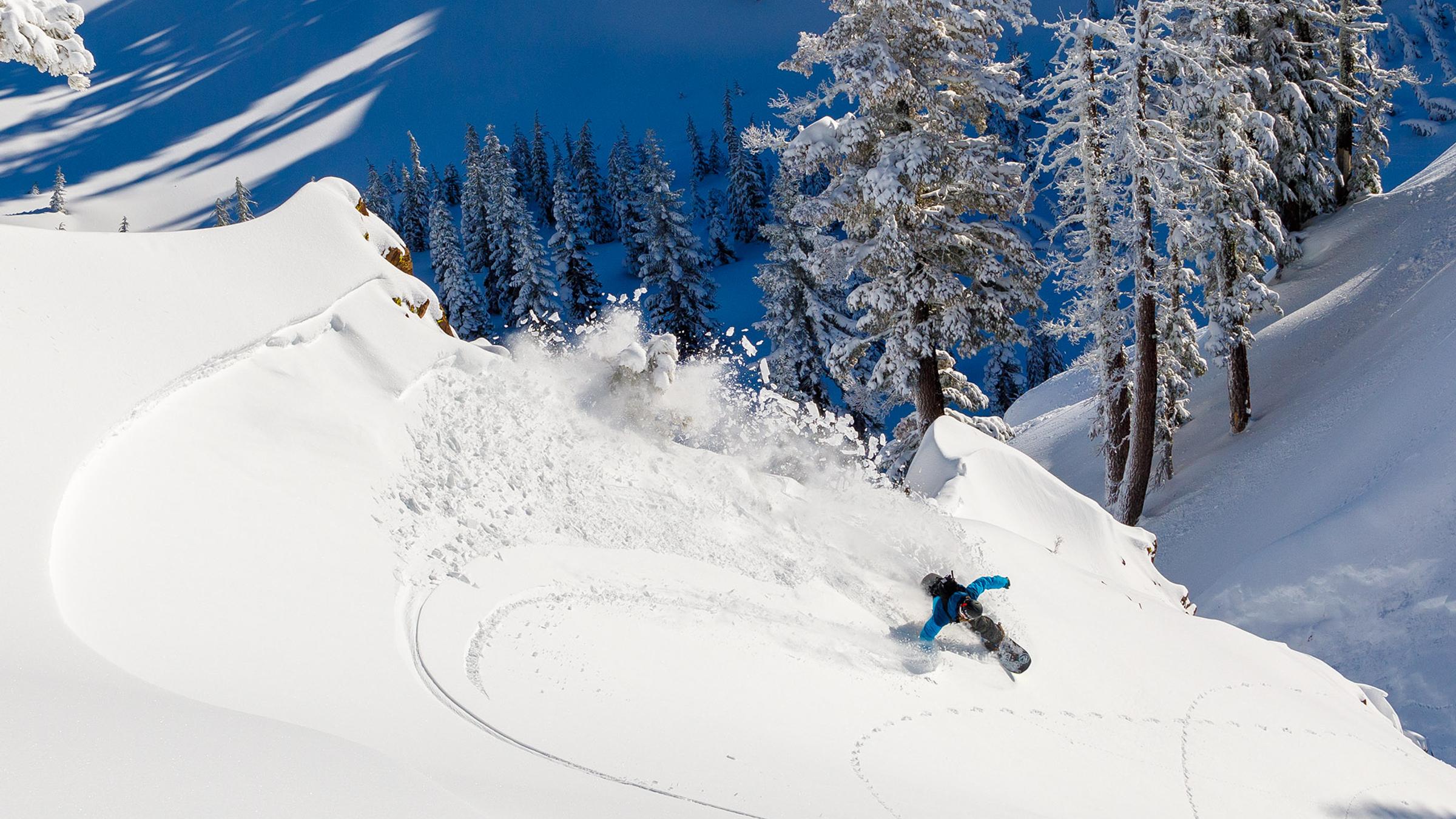 Tim Humphreys snowboarding & slashing powder at Apine Meadows